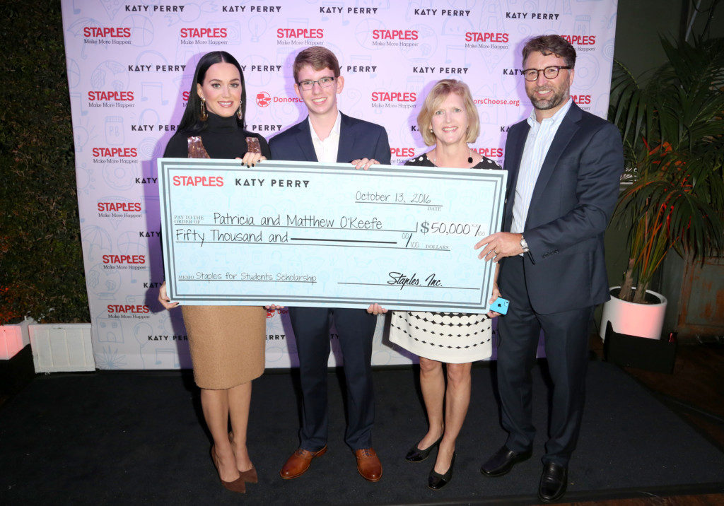 Global superstar Katy Perry and Staples for Students Sweepstakes grand prize winner Patricia OKeefe and her son Matthew and William Durling of Staples, attend the sweepstakes Winners VIP Celebration on Thurs., Oct. 13, 2016, in Los Angeles. The sweepstakes grand prize included a $50,000 scholarship and a trip to Los Angeles with a guest to meet Katy Perry. In April, as part of the Staples for Students program, Staples partnered with Perry to announce a $1 million donation to DonorsChoose.org. As a result, Staples fulfilled 1,072 classroom projects on DonorsChoose.org, providing 787 teachers and impacting 98,609 students across the country. Additionally, Staples customers donated more than $330,000 to DonorsChoose.org at Staples stores and at www.StaplesForStudents.com throughout the back-to-school season. (Casey Rodgers/AP Images for Staples)