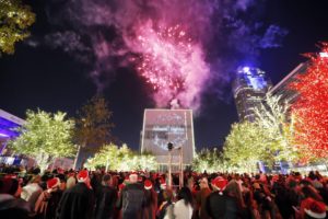 People enjoy fireworks and the dazzling display of more than 550,000 LED lights during the Reliant Lights Your Holidays at the AT&T Performing Arts Center on Saturday, Dec 5, 2015, in Dallas, TX. (Photo by Brandon Wade/Invision for Reliant/AP Images)
