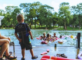 family playing in the lake, Texas road trip ideas