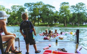 family playing in the lake, Texas road trip ideas