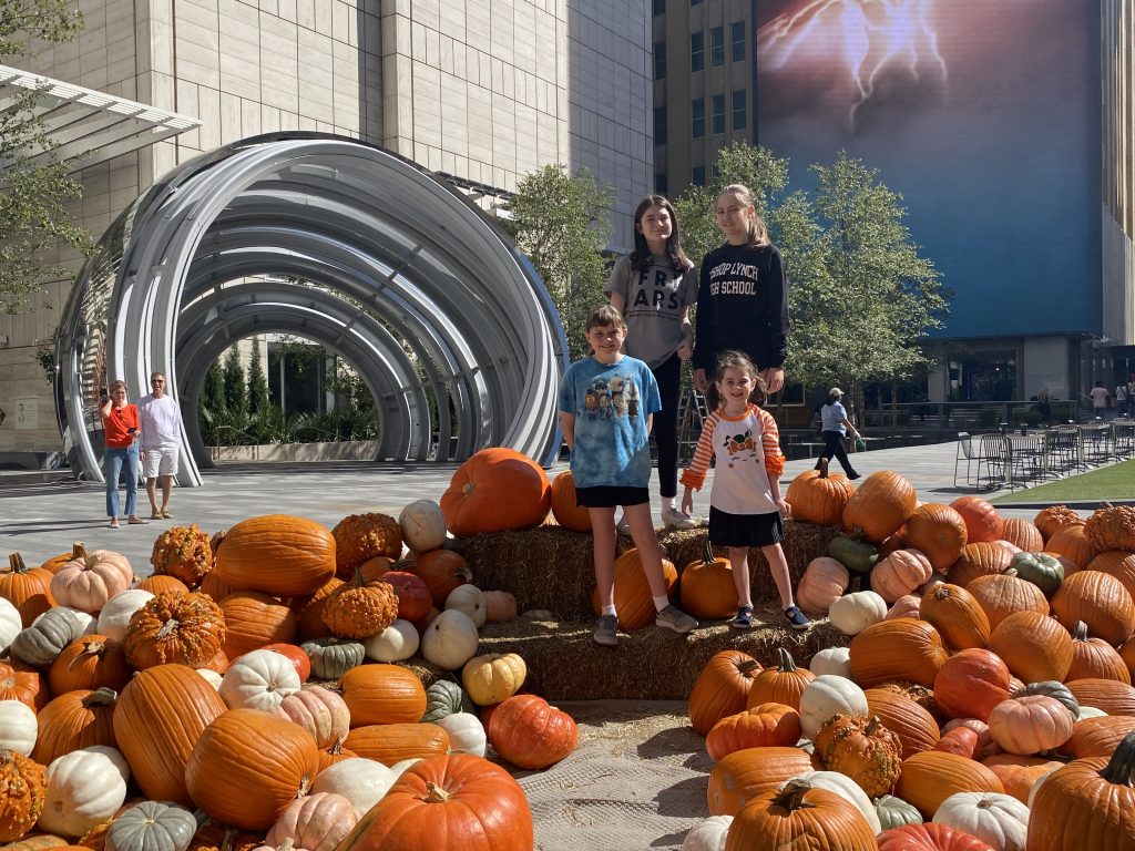 fall photo of kids at AT&T Discovery District, cool things to do in downtown dallas