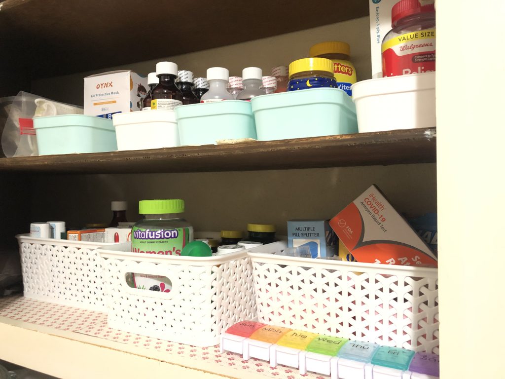 medicine cabinet organization with baskets
