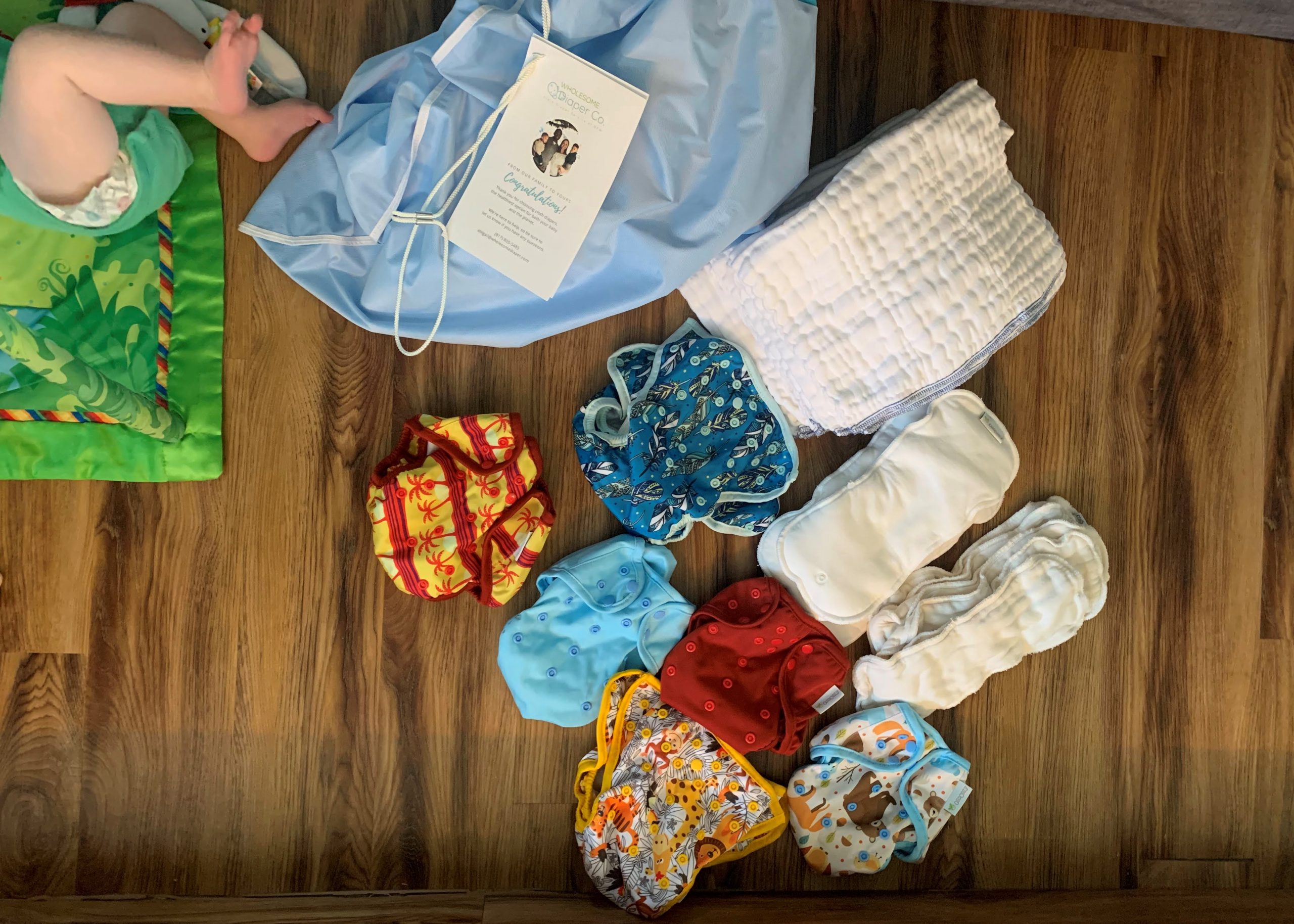 assorted cloth diapers, cloth diapering service Dallas