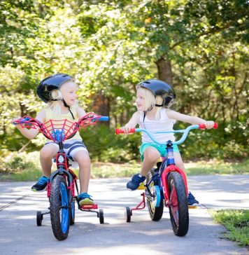 2 kids riding bikes