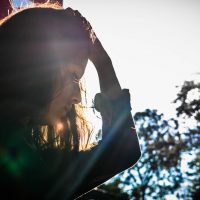 sad teen girl in profile, teen mental health concerns