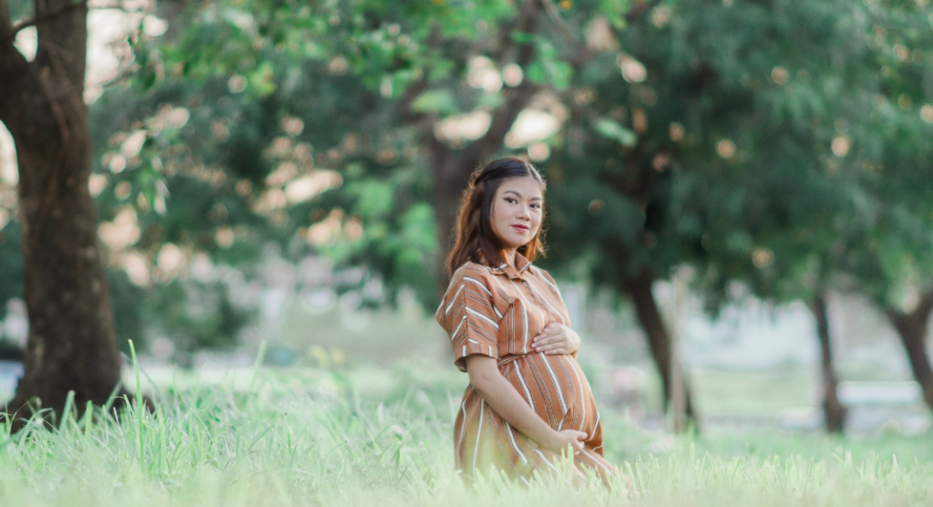 pregnant woman in field