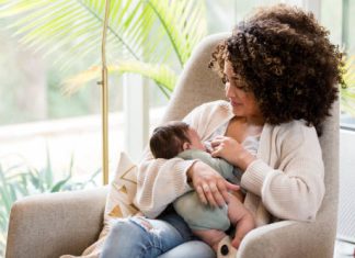 mother nursing newborn baby, breastfeeding myths