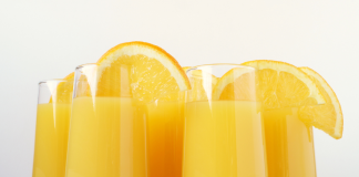 Mimosas with orange slices.