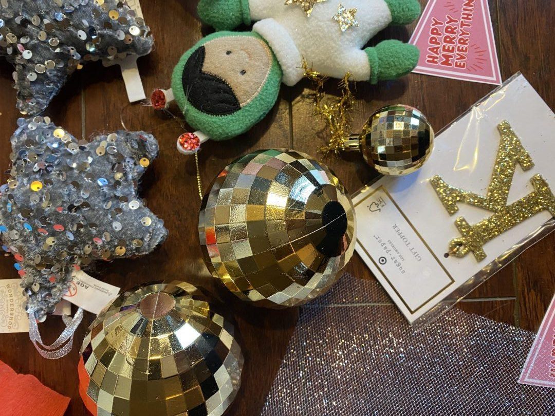 A variety of gift toppers lay in a pile.