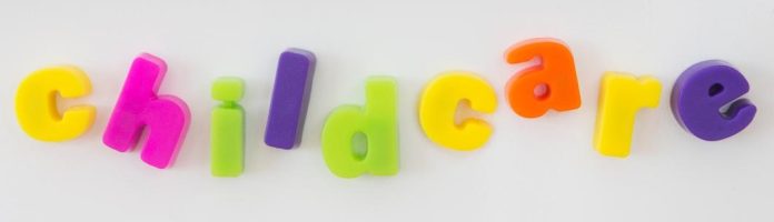 fridge magnets spelling out "childcare"