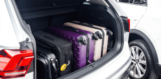 Suitcases in the trunk of a car.