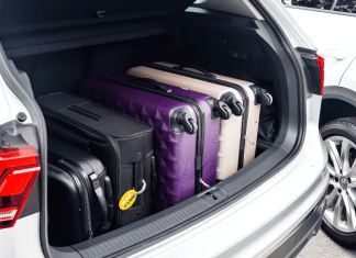 Suitcases in the trunk of a car.