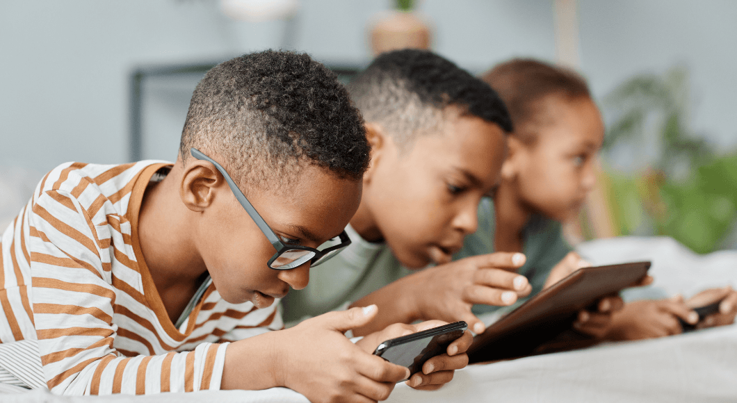 Kids watch their smart phones and tablets.