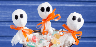 Lollipop ghosts in a bucket of candy.